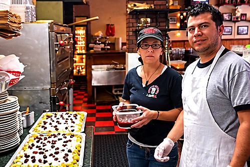 Monty's Pizzeria restaurant team